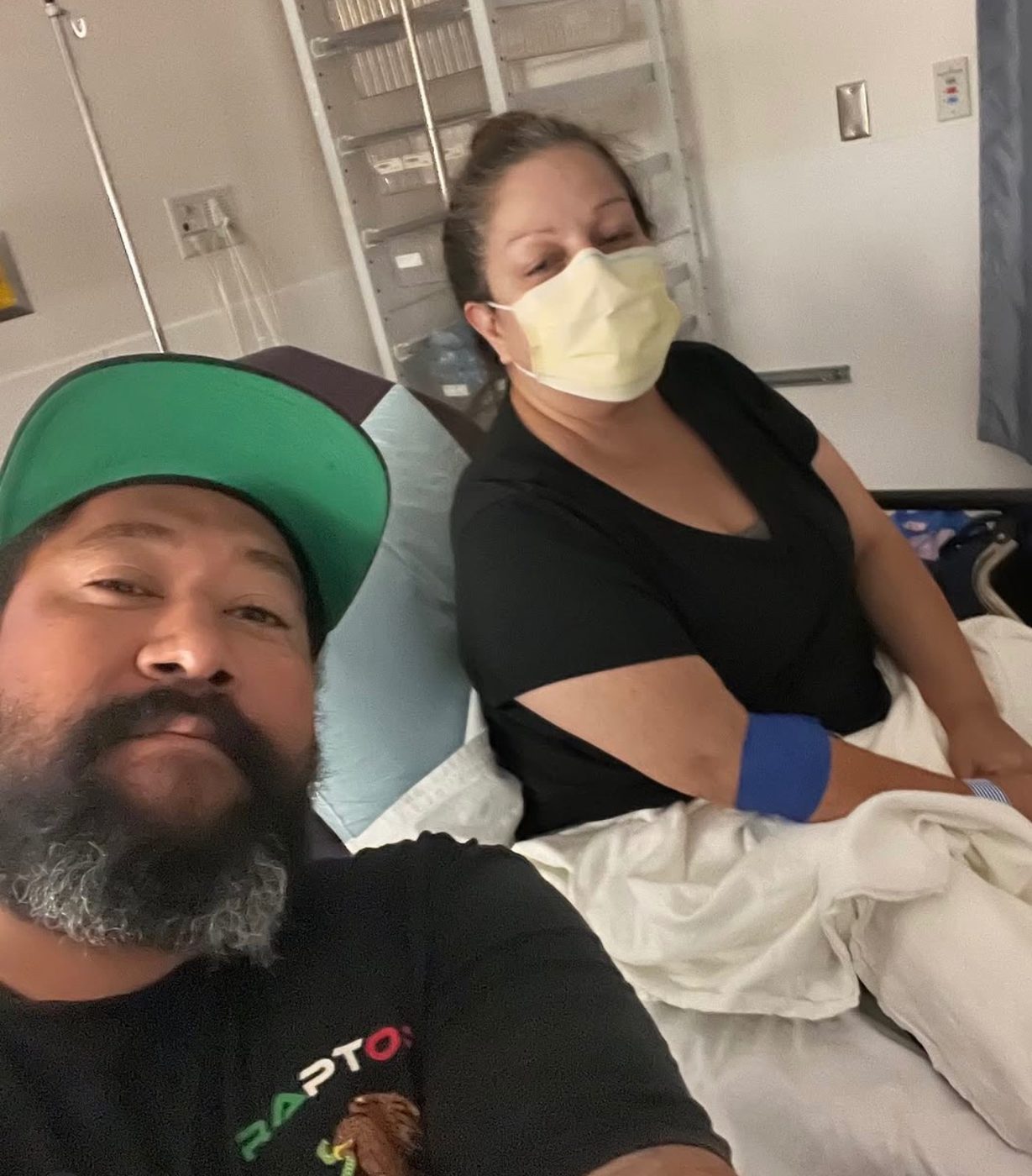 Isabel resting in a hospital bed during treatment